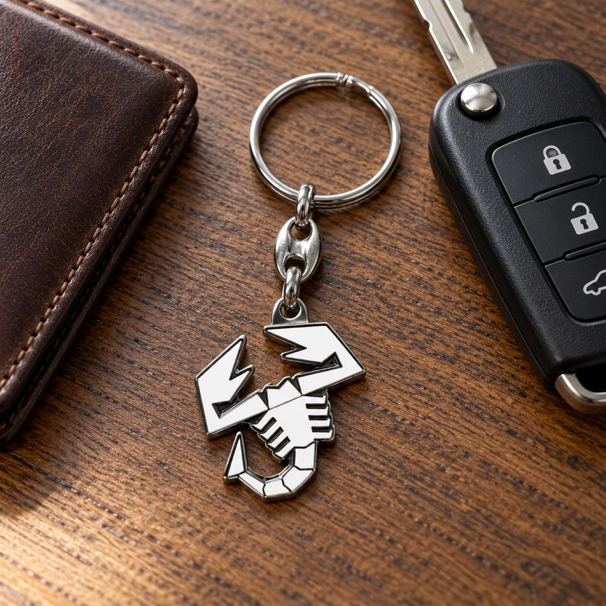 Metalowy brelok Abarth ze skorpionem – zdjęcie poglądowe (AI)