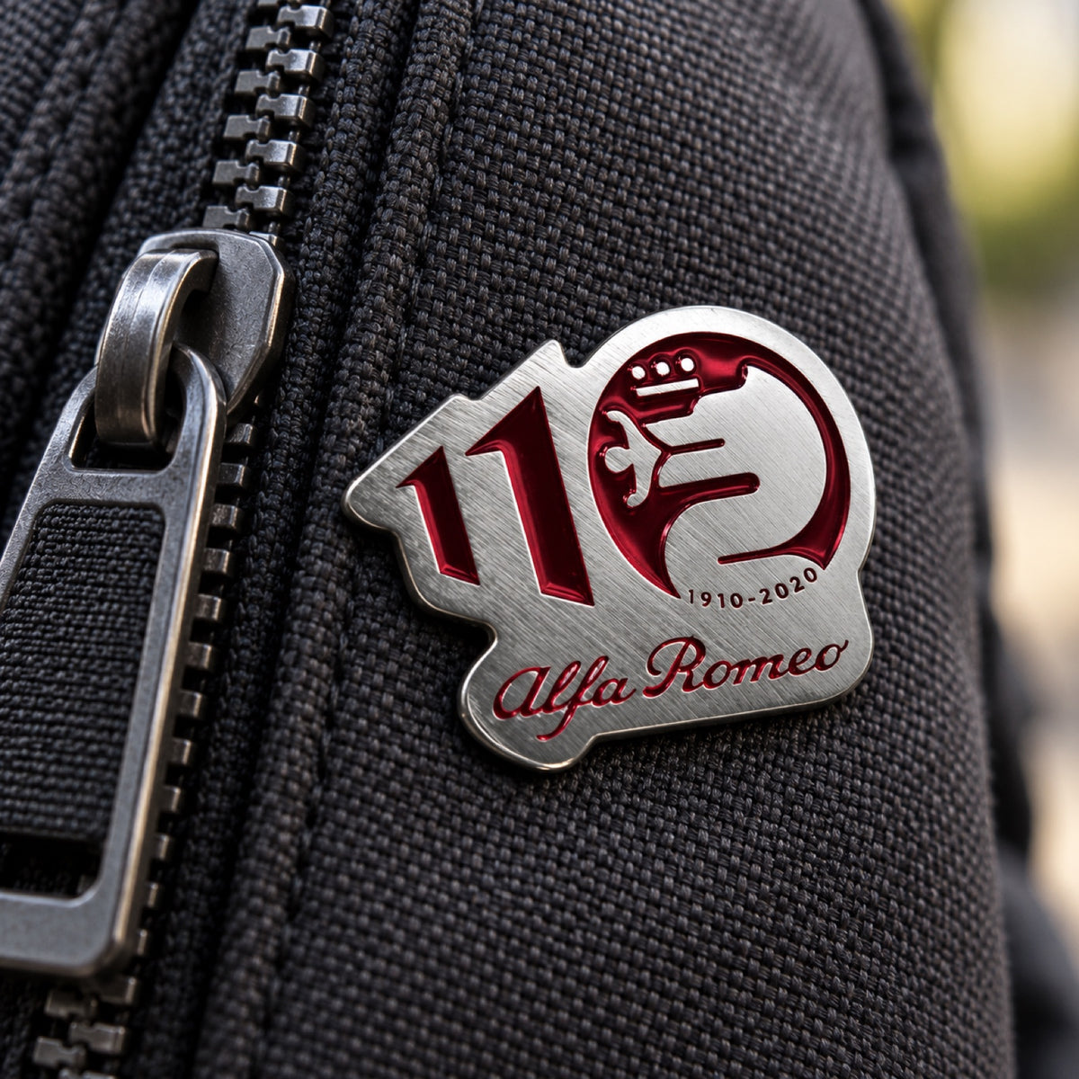 Alfa Romeo 110th Anniversary Metal Badge – Red – illustrative photo (AI)