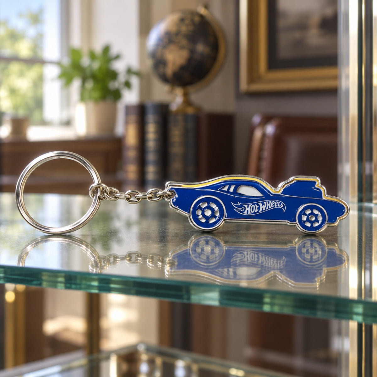 Metalowy brelok Hot Wheels w kształcie autka z logo – zdjęcie poglądowe (AI)