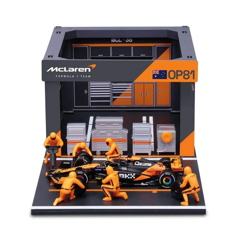 Model Bburago McLaren F1 1:43 Oscar Piastri z modelem boksu